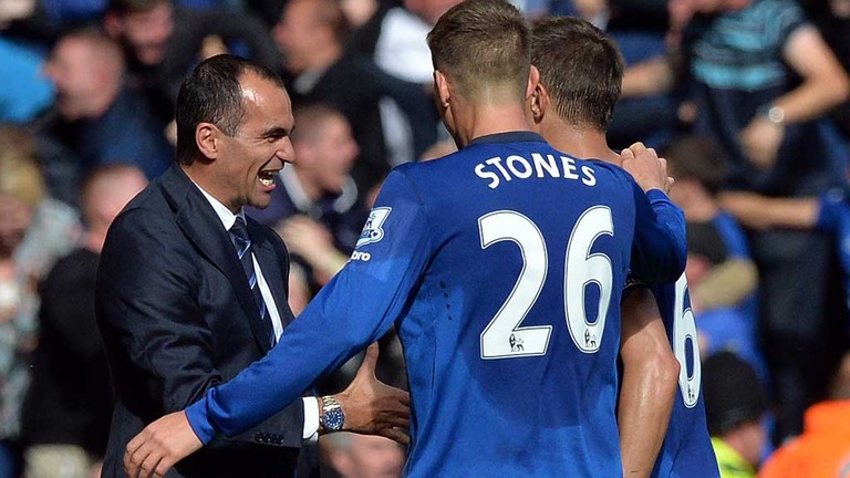 Roberto Martinez and John Stones