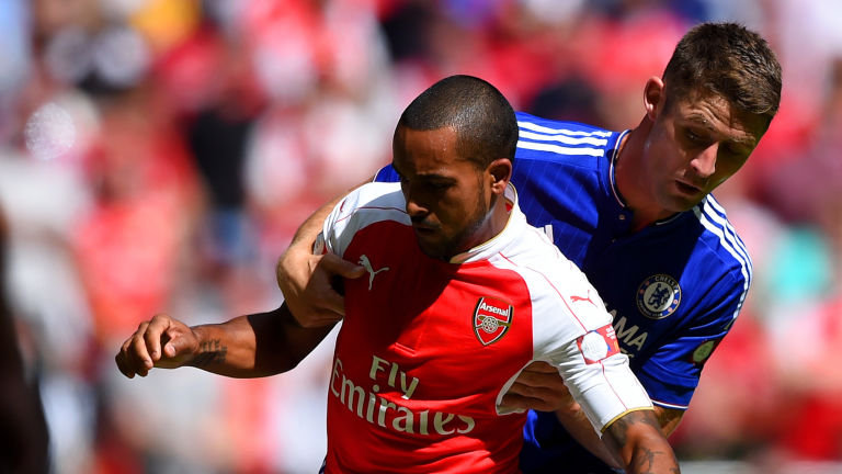 Theo Walcott and Gary Cahill