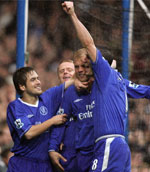 Eidur Gudjohnsen congratulated by his team mates