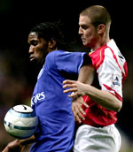 Drogba  fights for the ball