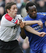 Brown and Essien fight for possession