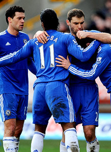 Didier Drogba congratulated by Chelsea players