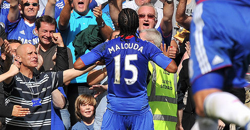 Florent malouda celebrates his goal