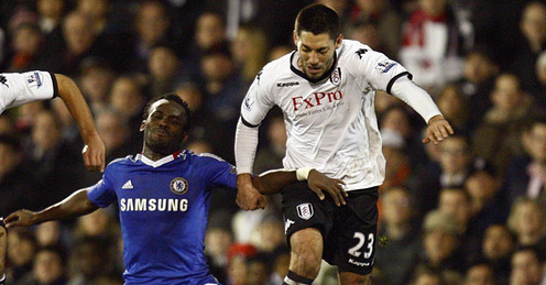 Michael Essien and Clint Dempsey