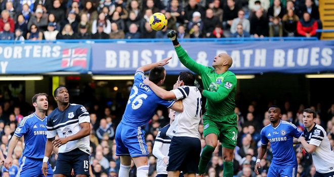Tim Howard punches clear