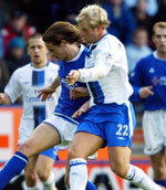 Gudjohnsen battles for possession