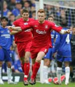 Riise celebrates his goal